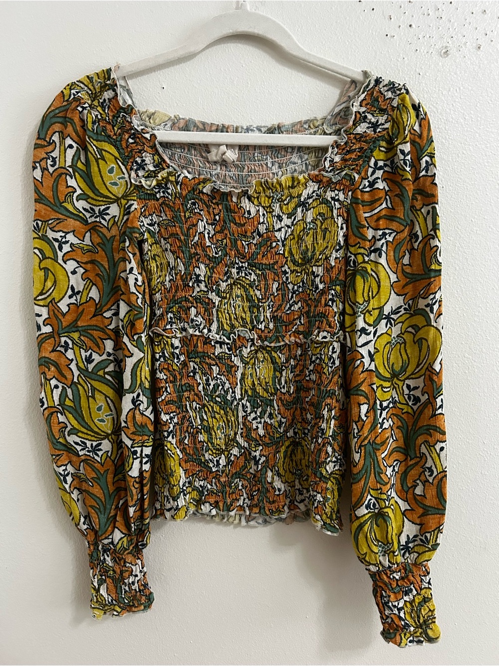 Anthropologie yellow and orange floral print smocked top